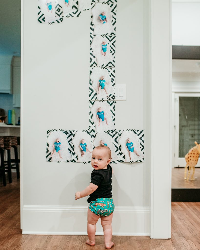 Number 1 First Birthday Party Wall decor using milestone photos 