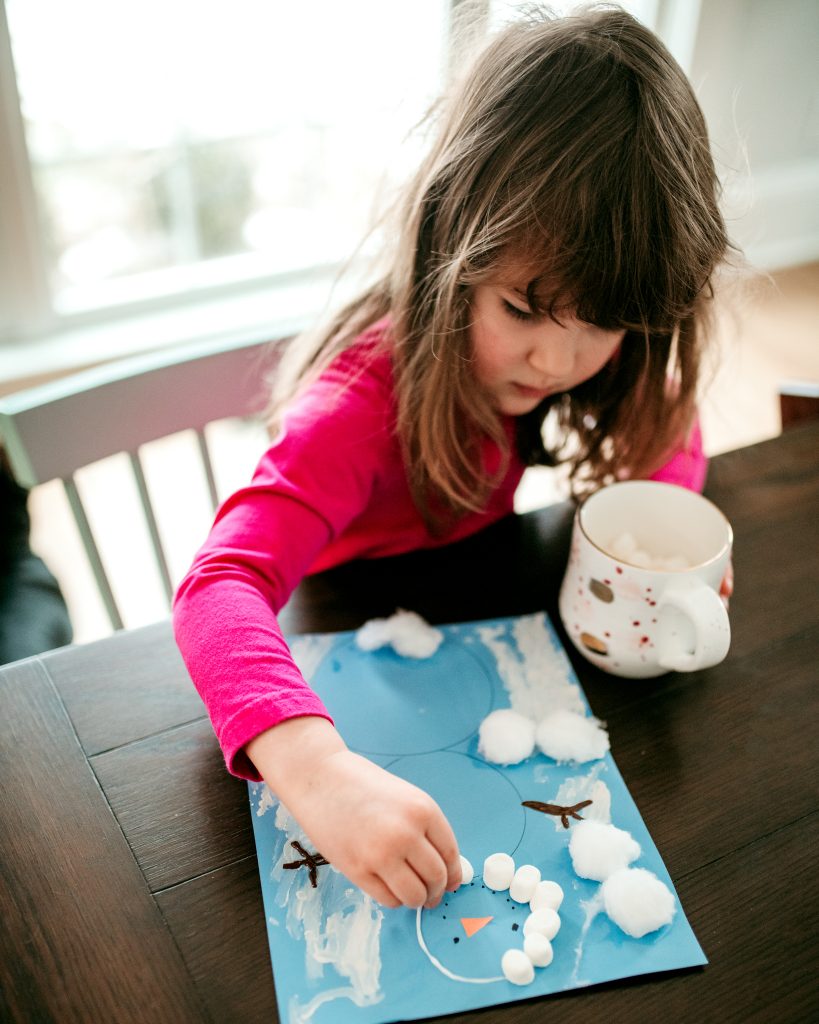 Build a marshmallow snowman with this winter craft for kids