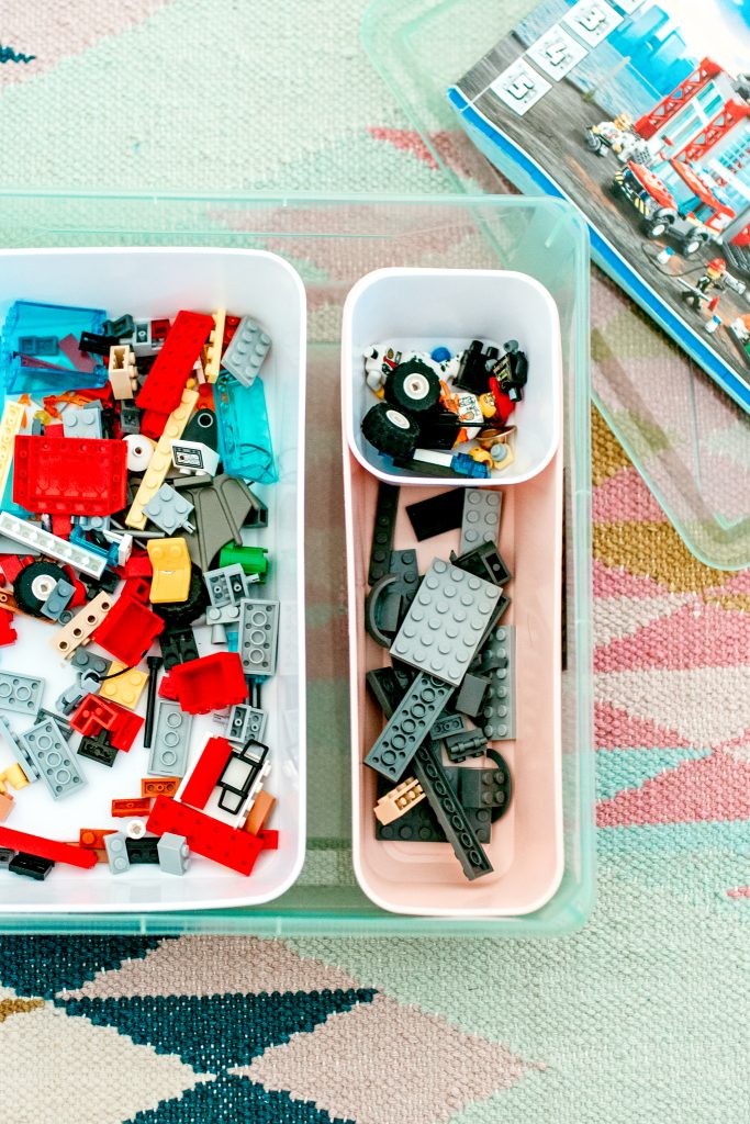 Legos sorted in a DIY storage bin