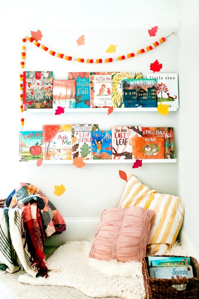 Creating a cozy autumn book corner with our favorite fall titles, soft blankets and pillows, and DIY decorations!