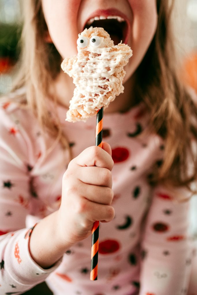 Rice Krispie Treat Ghosts are an adorably yummy and easy-to-make homemade Halloween Treat for your kids ! 