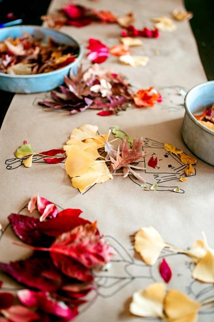 Beautiful Fall Paper Doll Leaf Craft for kids! Incorporate a nature walk to collect leaves and then use them to design stunning outfits !