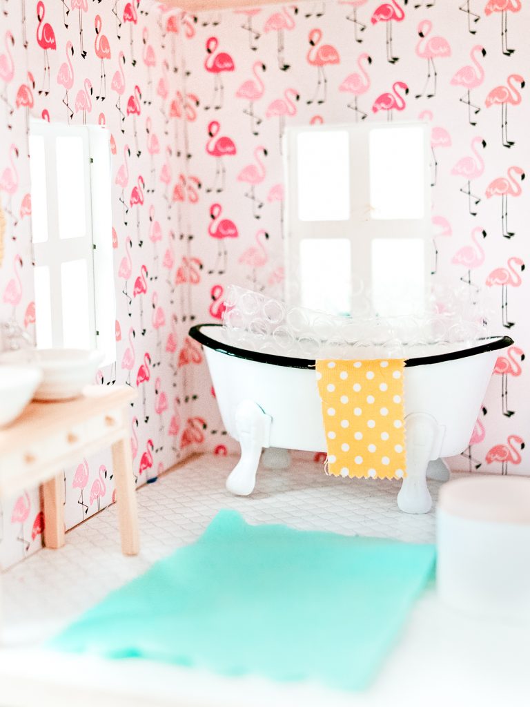 DIY Bright and Colorful dollhouse bathroom with flamingo wallpaper, double sink, and clawfoot tub