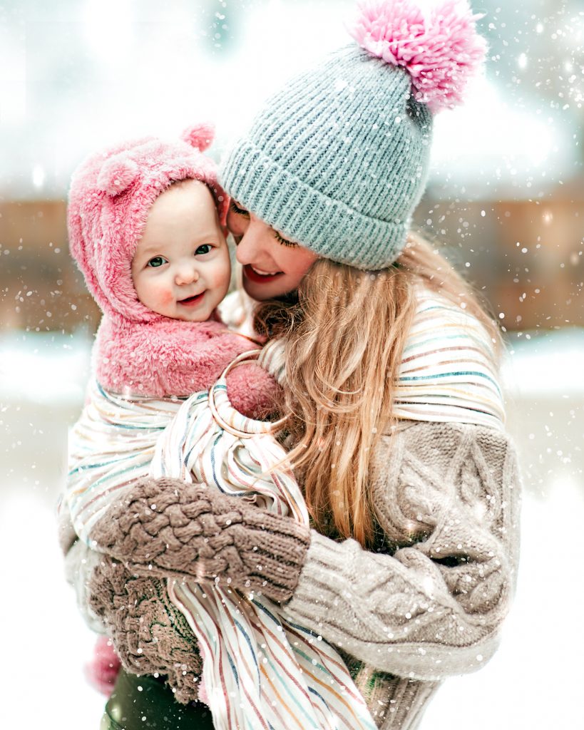 Mommy and me photo in the snow. Winter style for mommy and baby. Chunky knits, baby bear bunting, and bright colors. 