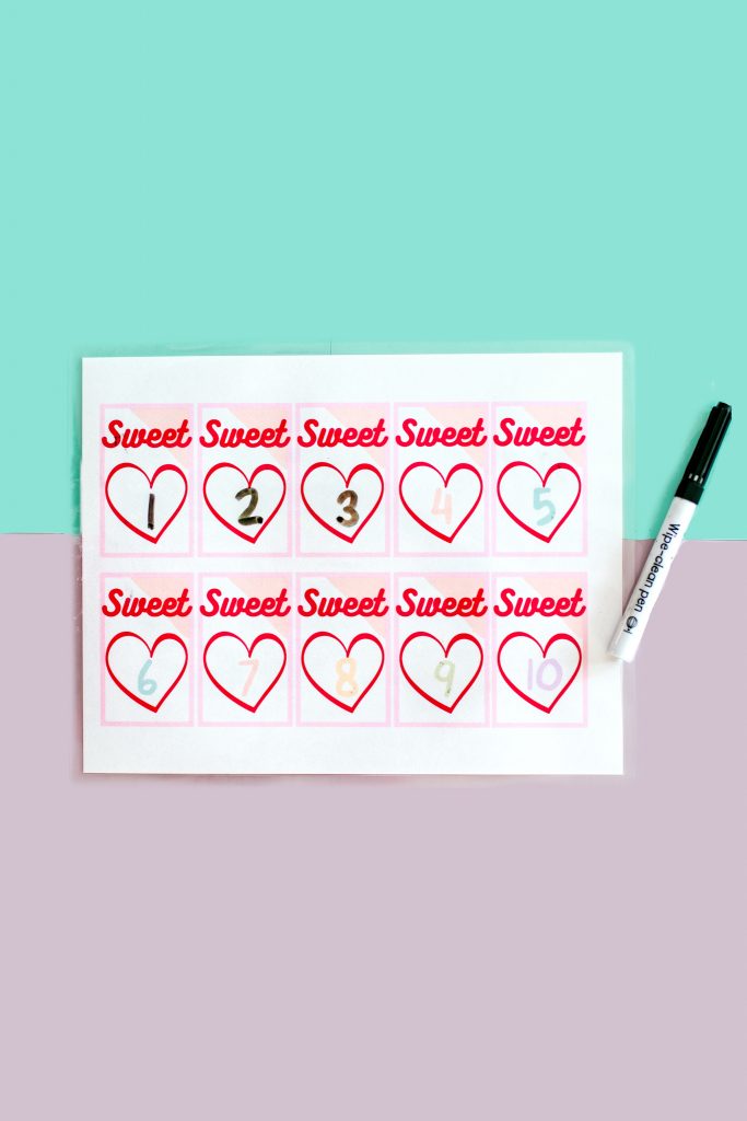 Laminate a worksheet to practice writing over and over again with a dry erase marker and more math activities for Valentine's Day! 