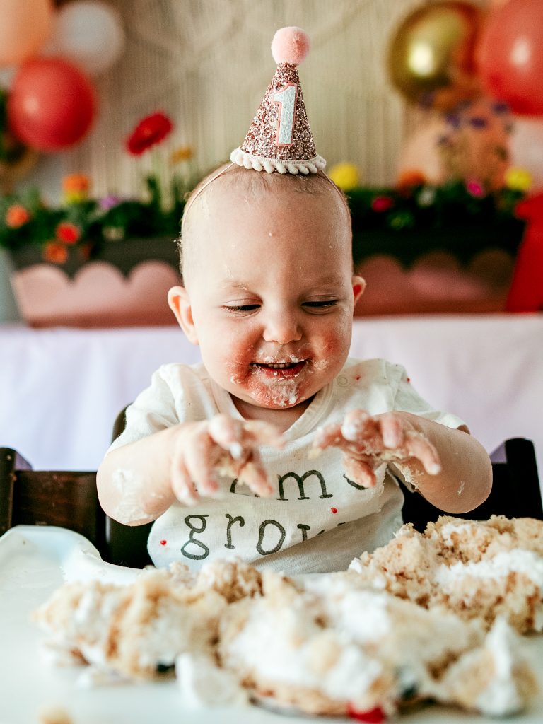 One year old girl smash cake photo