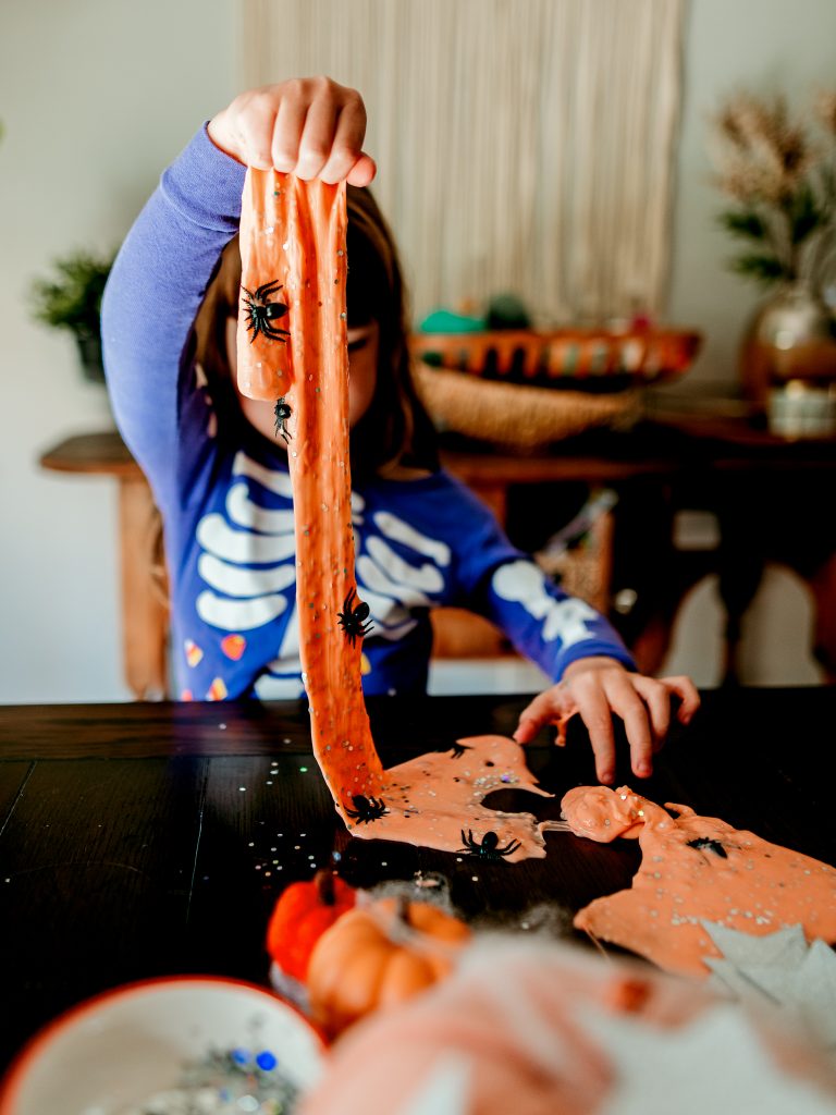 Have fun sensory play with homemade Halloween Slime ! Easy recipe to make slime at home! Kids halloween activity 