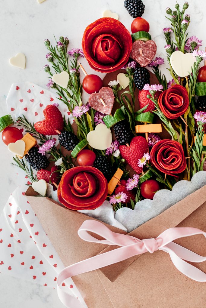 Elevate your snack board by following these steps to make roses for a charcuterie bouquet!