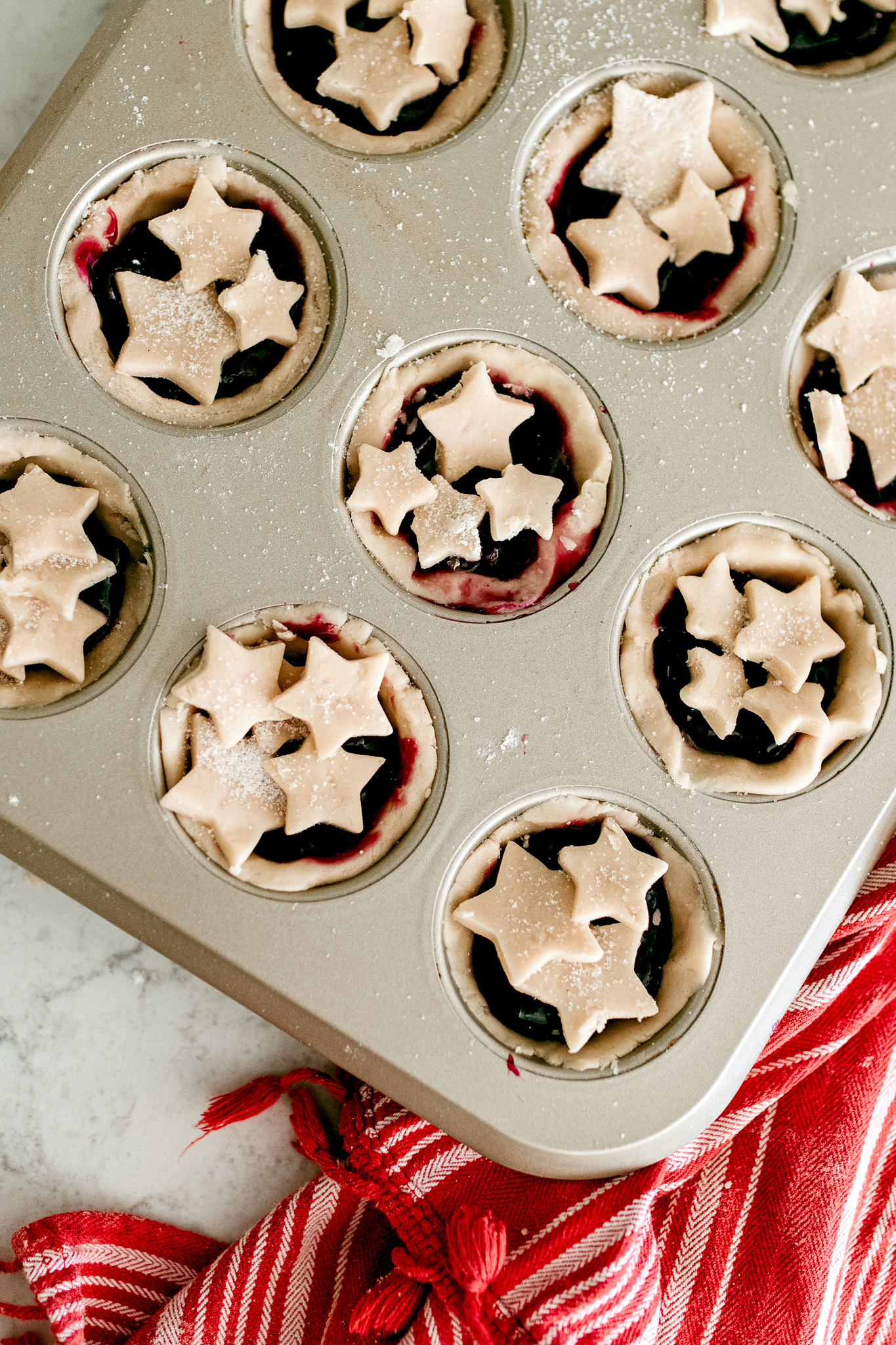 Star crust mini pies made in a muffin tin! Easy to make directions.