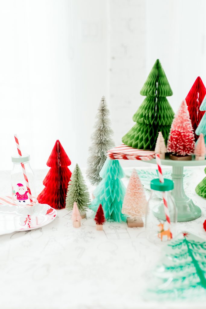 Whimsical Christmas tablescape using bottlebrush and honeycomb trees. 