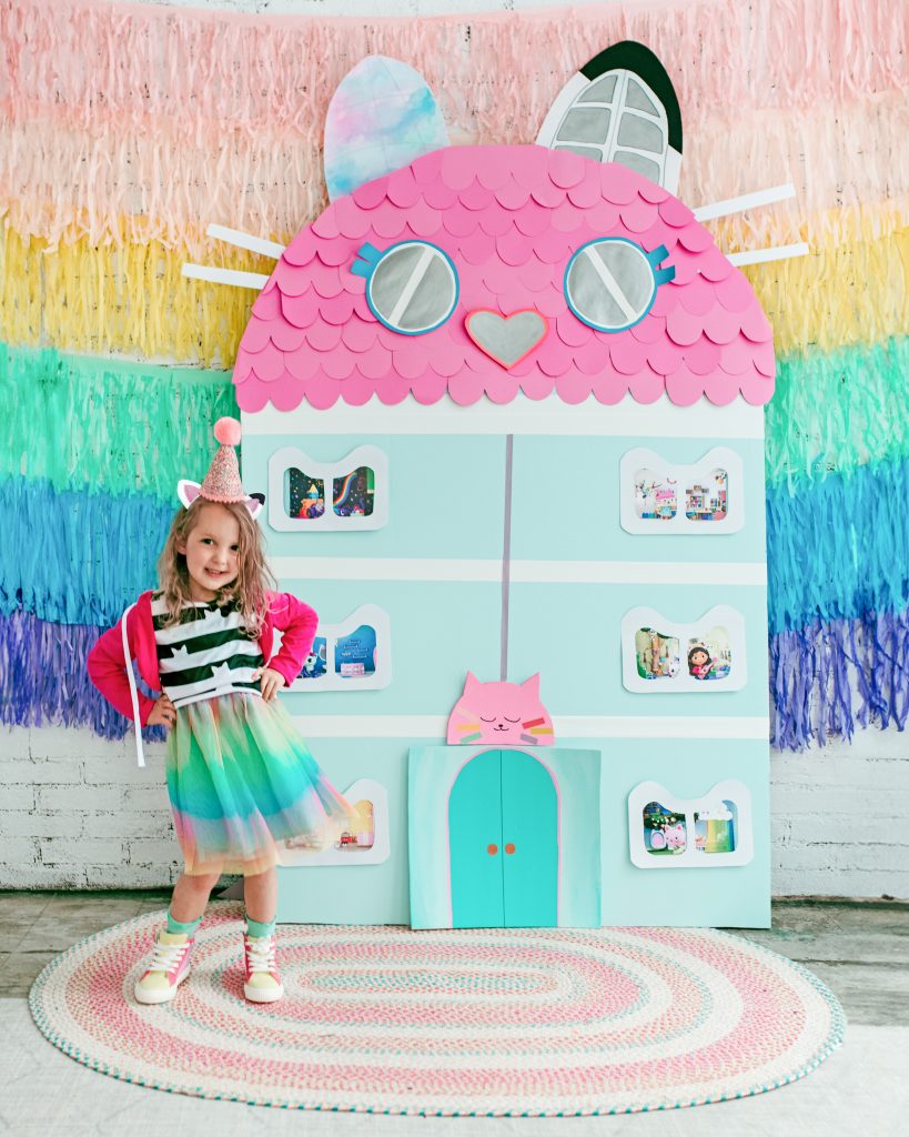A cat-tastic Gabby's Dollhouse Birthday party with DIY backdrop, treats and favors.