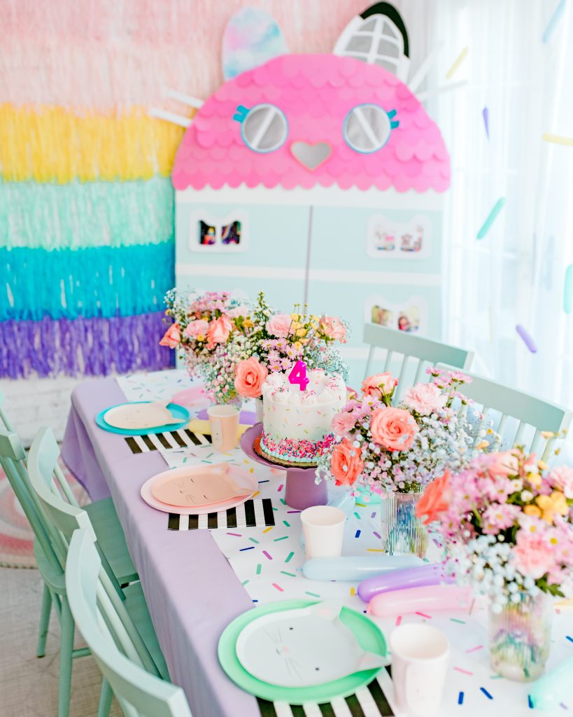 Gabby's Dollhouse birthday party table and decor 