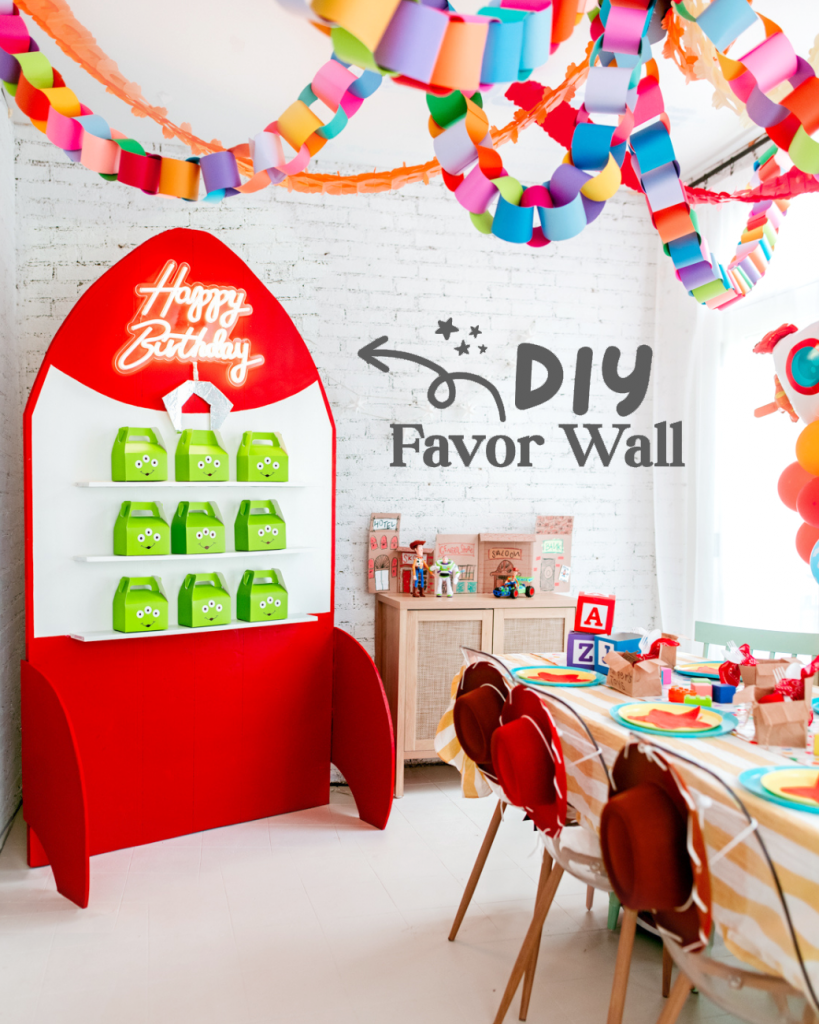 Tutortial DIY Toy Story party favor wall. Rocket inspired by The Claw from Pizza Planet with shelves and green alien favor boxes